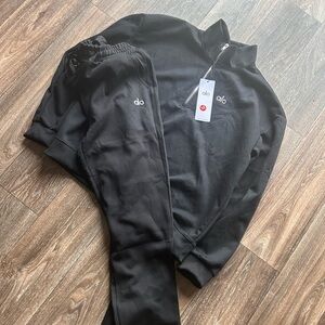 Depop-dreezzyworldwide ALO Yoga Black Zip Up Sweater
Fees are way cheaper